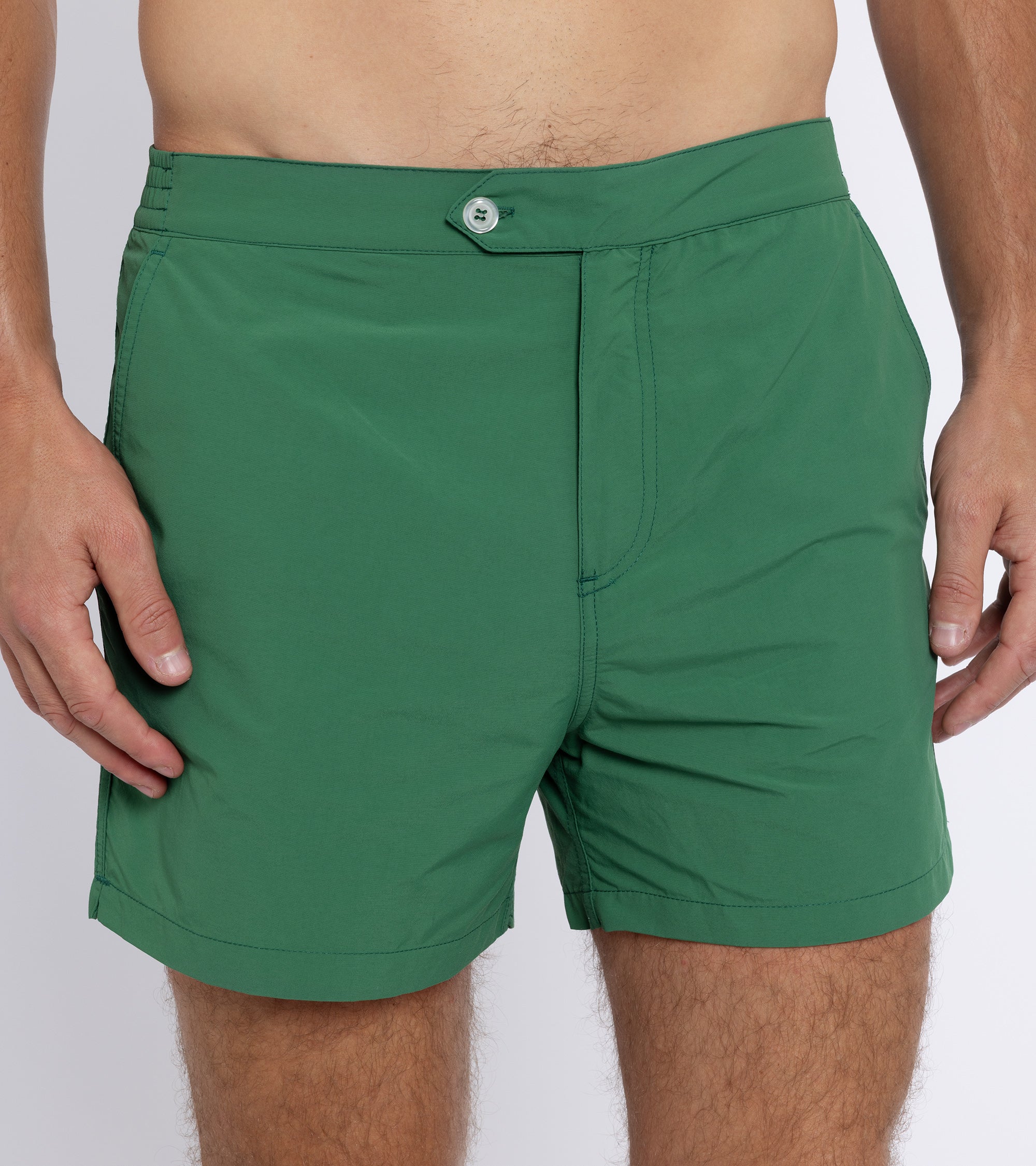Trunk Foley swim shorts in green, fabric detail.