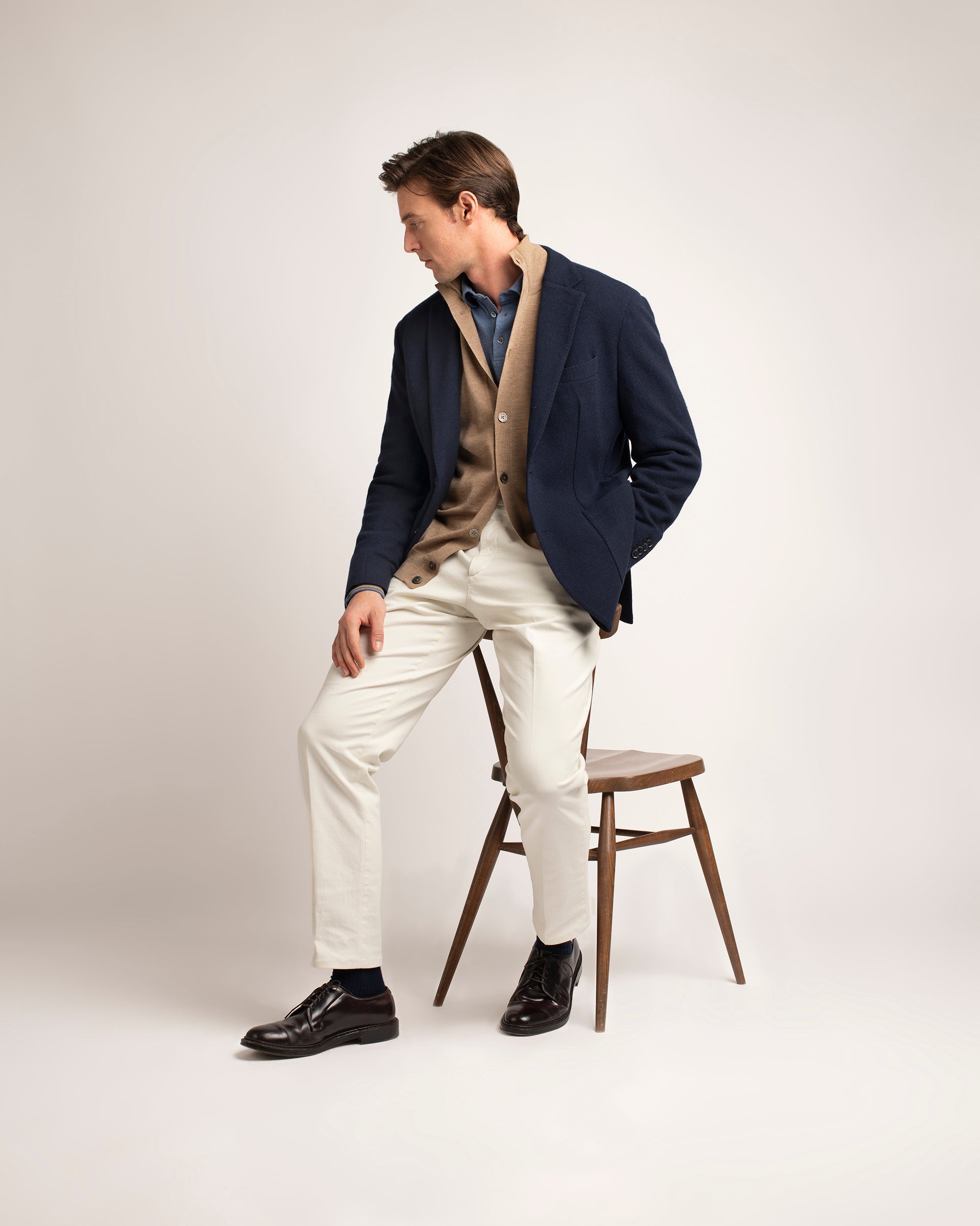Trunk Palmer flat front trousers in bone, styled shot.