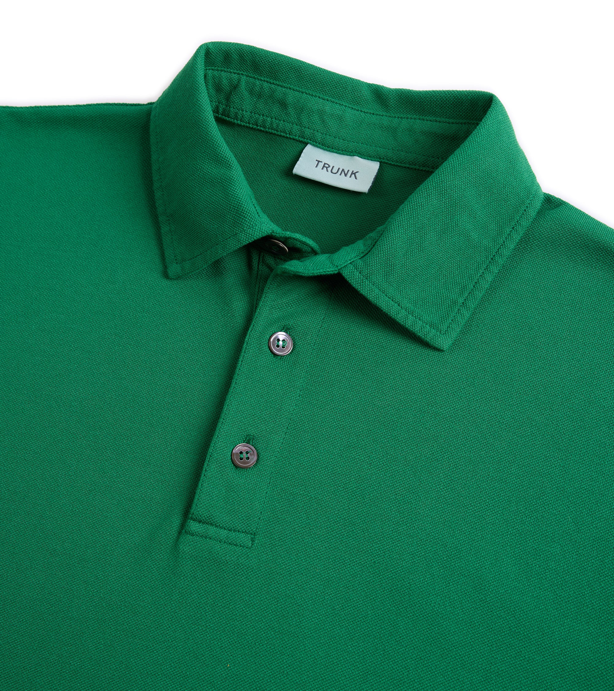 Trunk Moxon short sleeve polo shirt in green, back view.