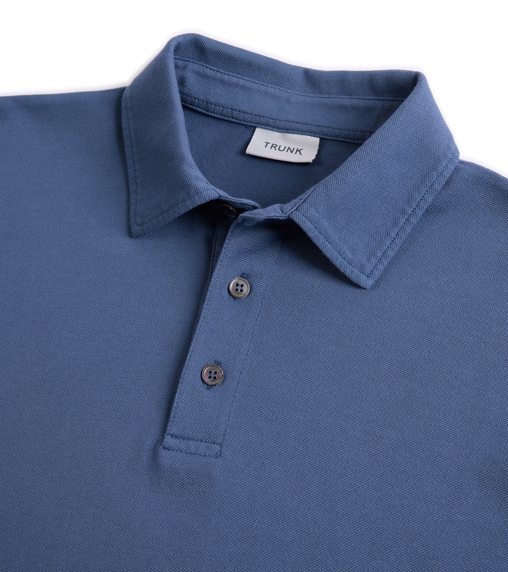 Trunk Moxon short sleeve polo shirt in indigo, back view.