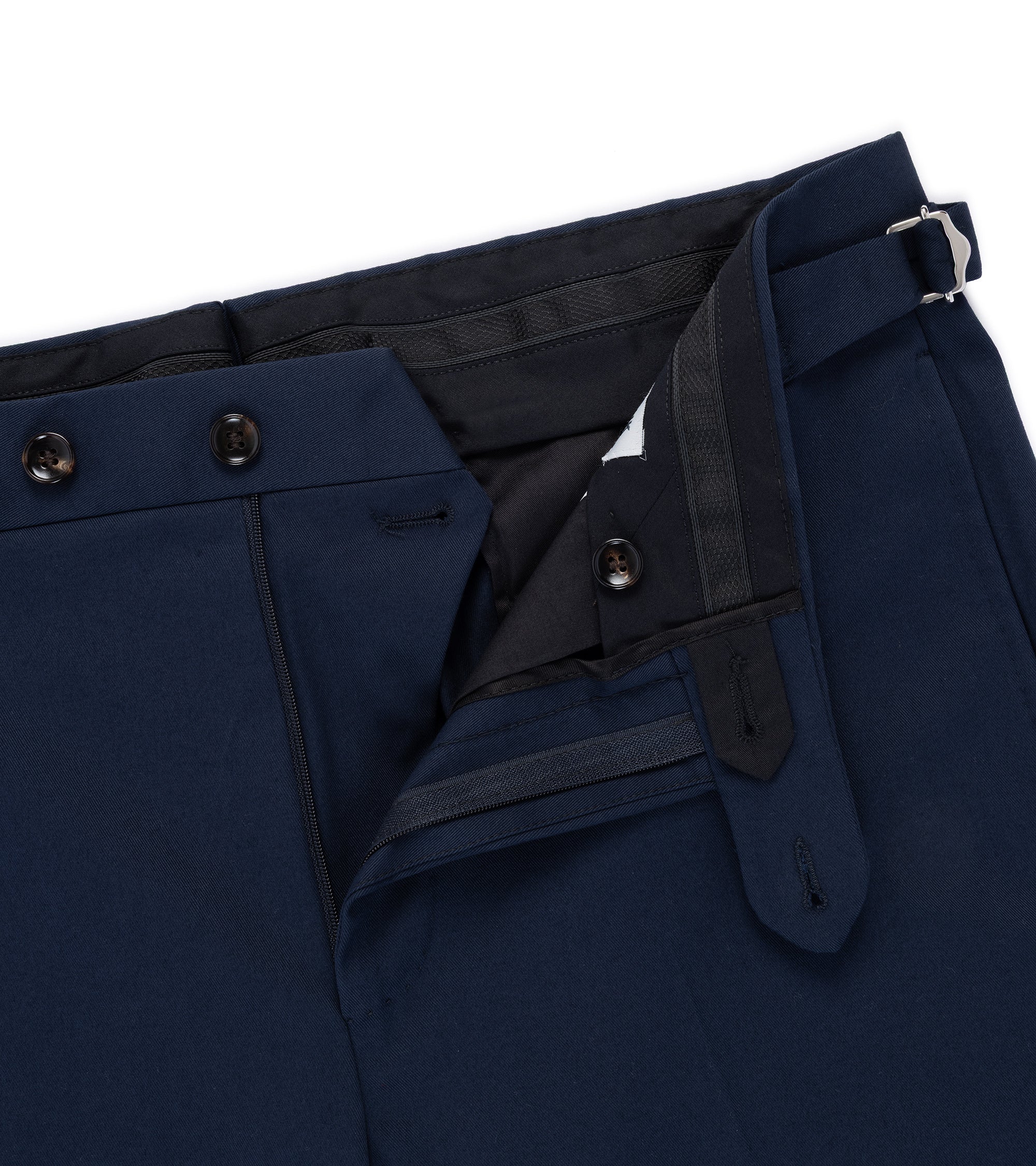 Trunk Walbrook cotton tailored trousers in navy, close-up of the waistband and pocket.