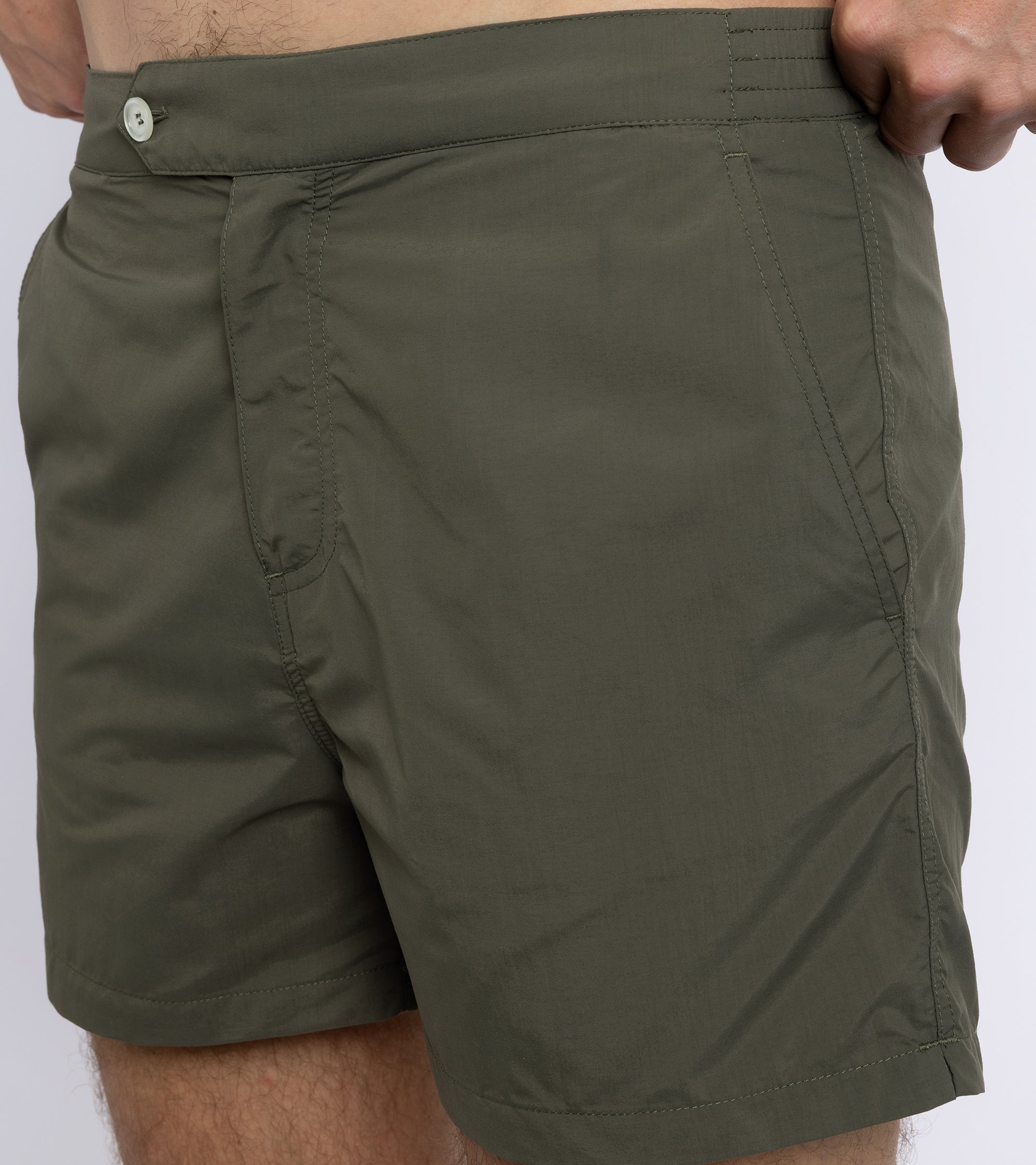 Trunk Foley swim shorts in olive, fabric detail.