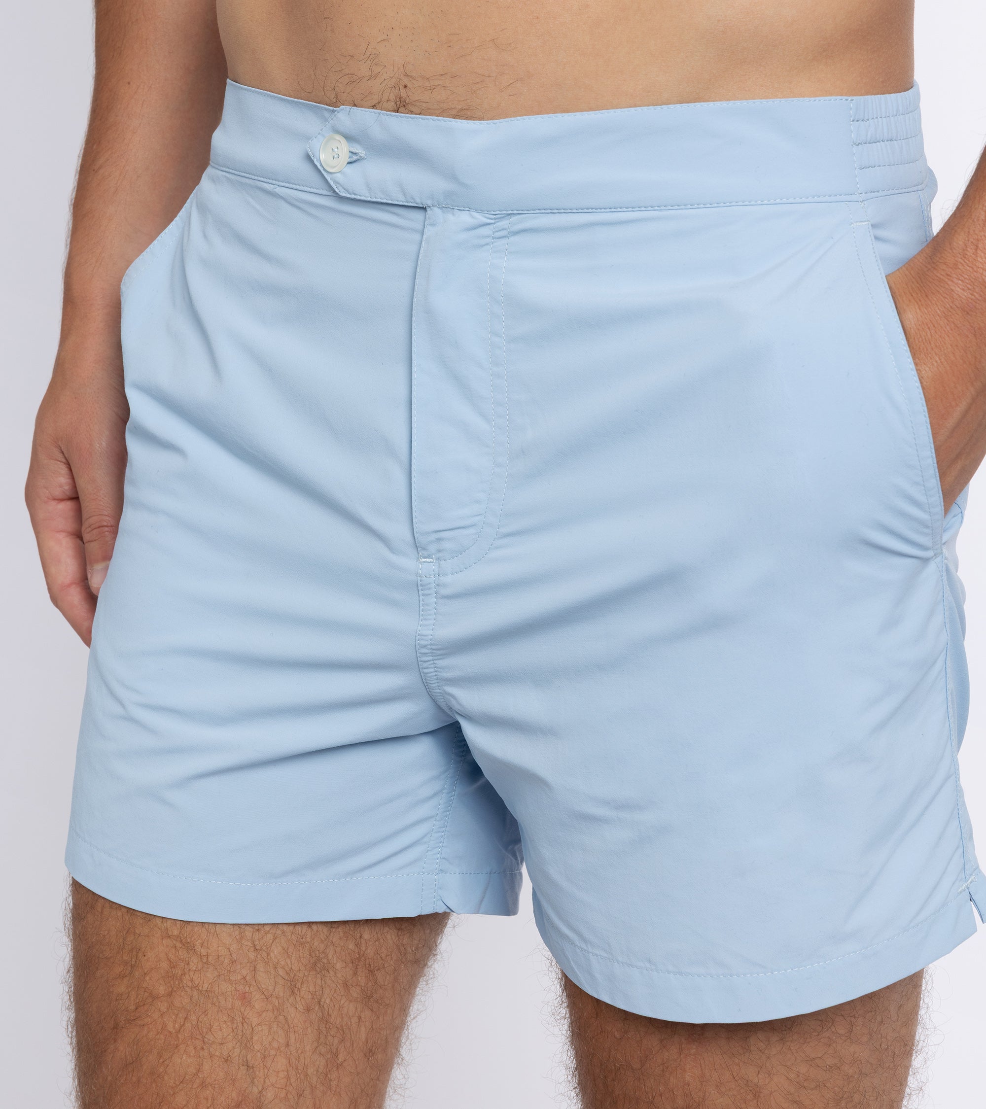 Trunk Foley swim shorts in light blue, fabric detail.
