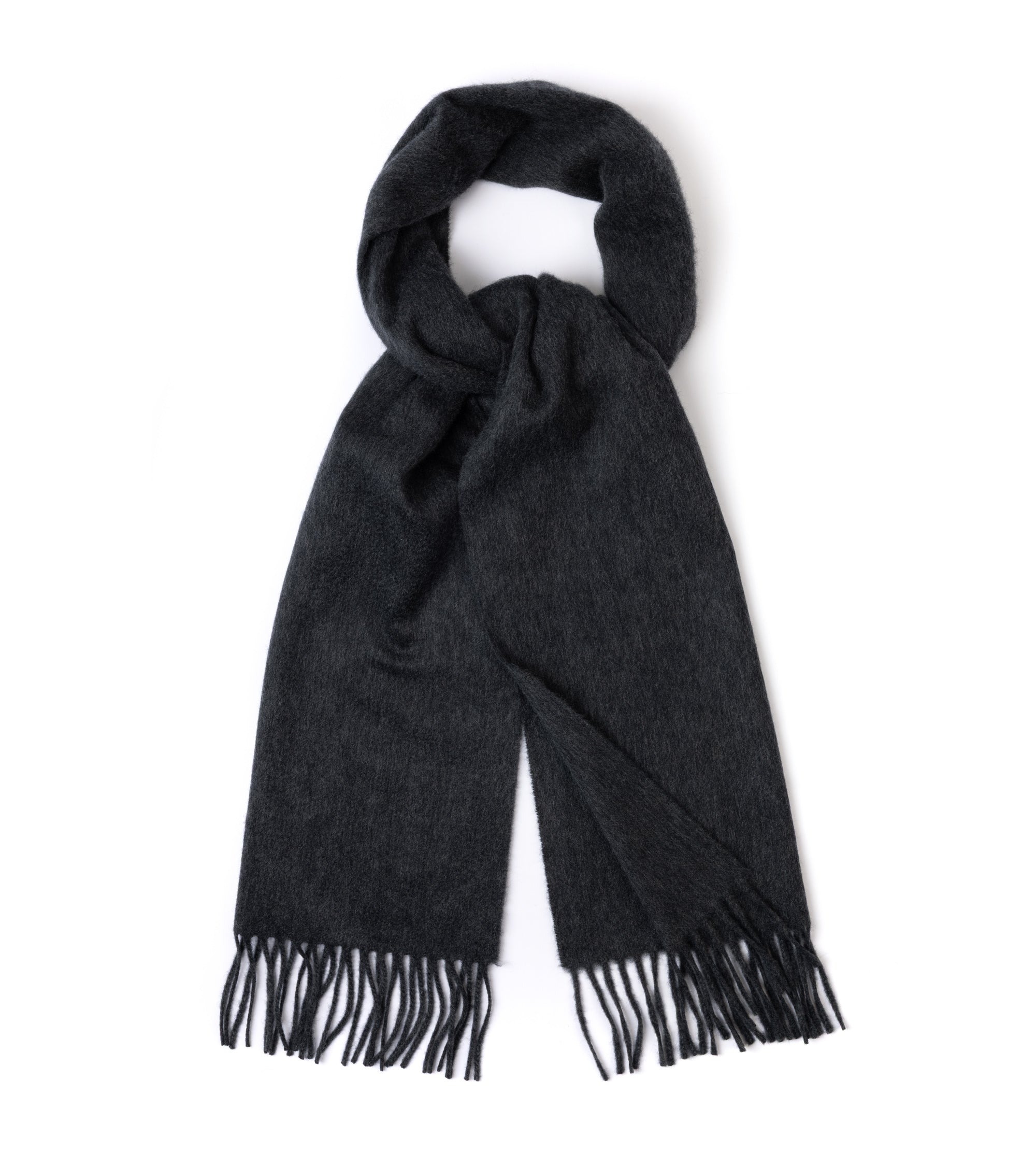 A dark charcoal gray woven scarf with fringed ends, displayed looped on a clean white background.