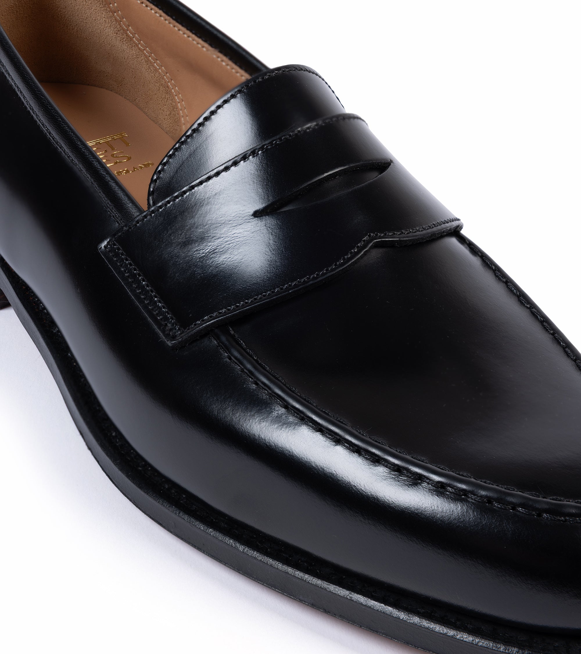 Crockett & Jones Boston loafer in black cavalry leather, close-up of the leather texture.