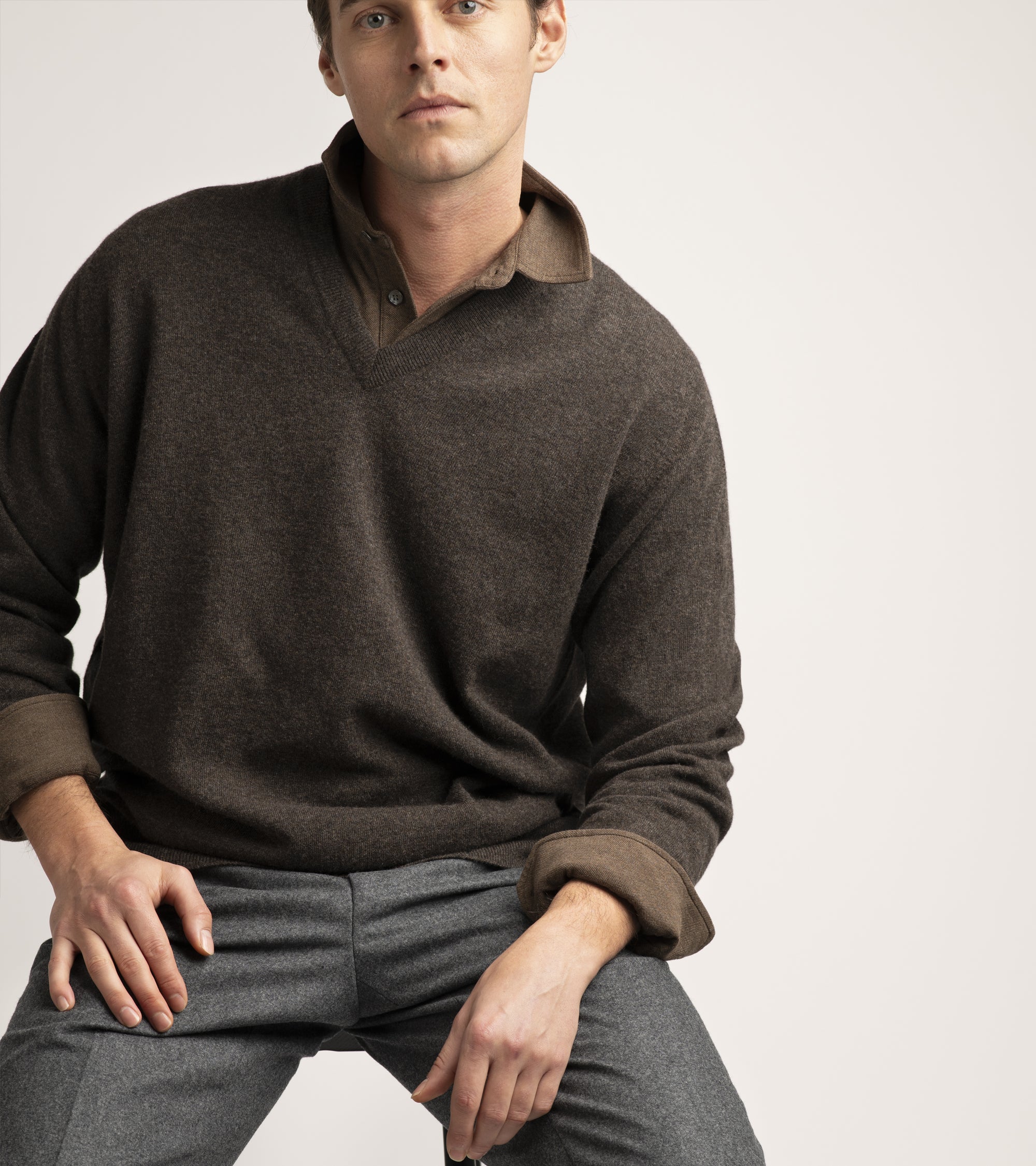 Trunk Moxon long sleeve polo shirt in brown marl, styled shot.
