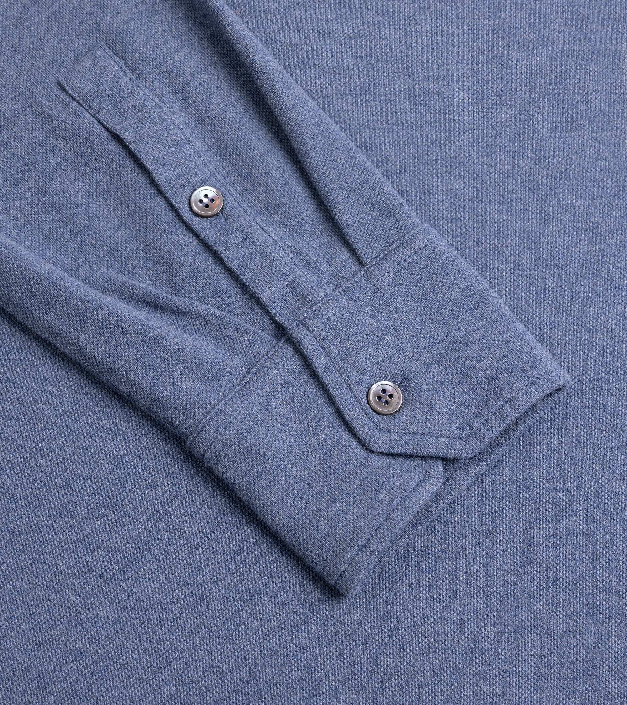 Trunk Moxon long sleeve polo shirt in blue marl, fabric detail.